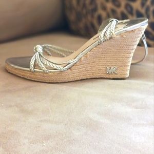 Michael Kors silver wedge sandals. 4" heel. Size 7?